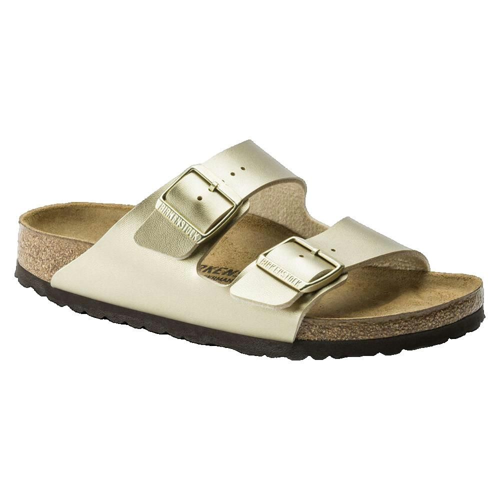 Sandali dorati con due cinturini e fibbie. Plantare in sughero, suola nera. Logo Birkenstock sulla fibbia.