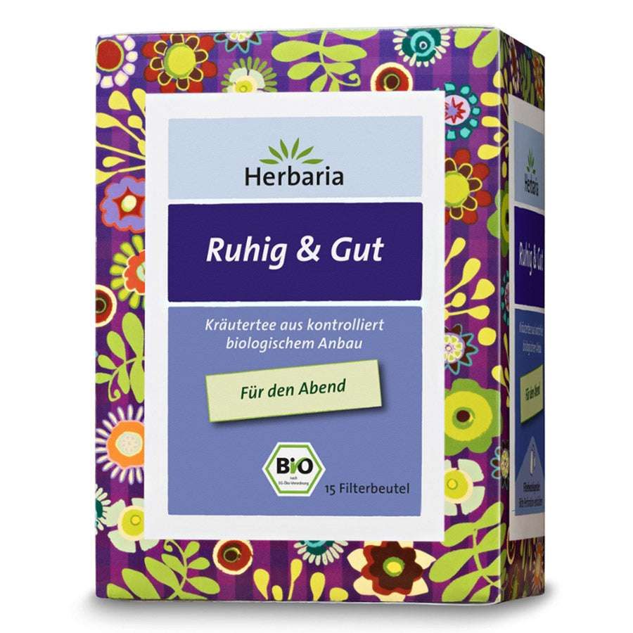 Karton mit Aufschrift "Herbaria Ruhig & Gut". Kräutertee aus kontrolliert biologischem Anbau. 15 Filterbeutel. Bio-Siegel.