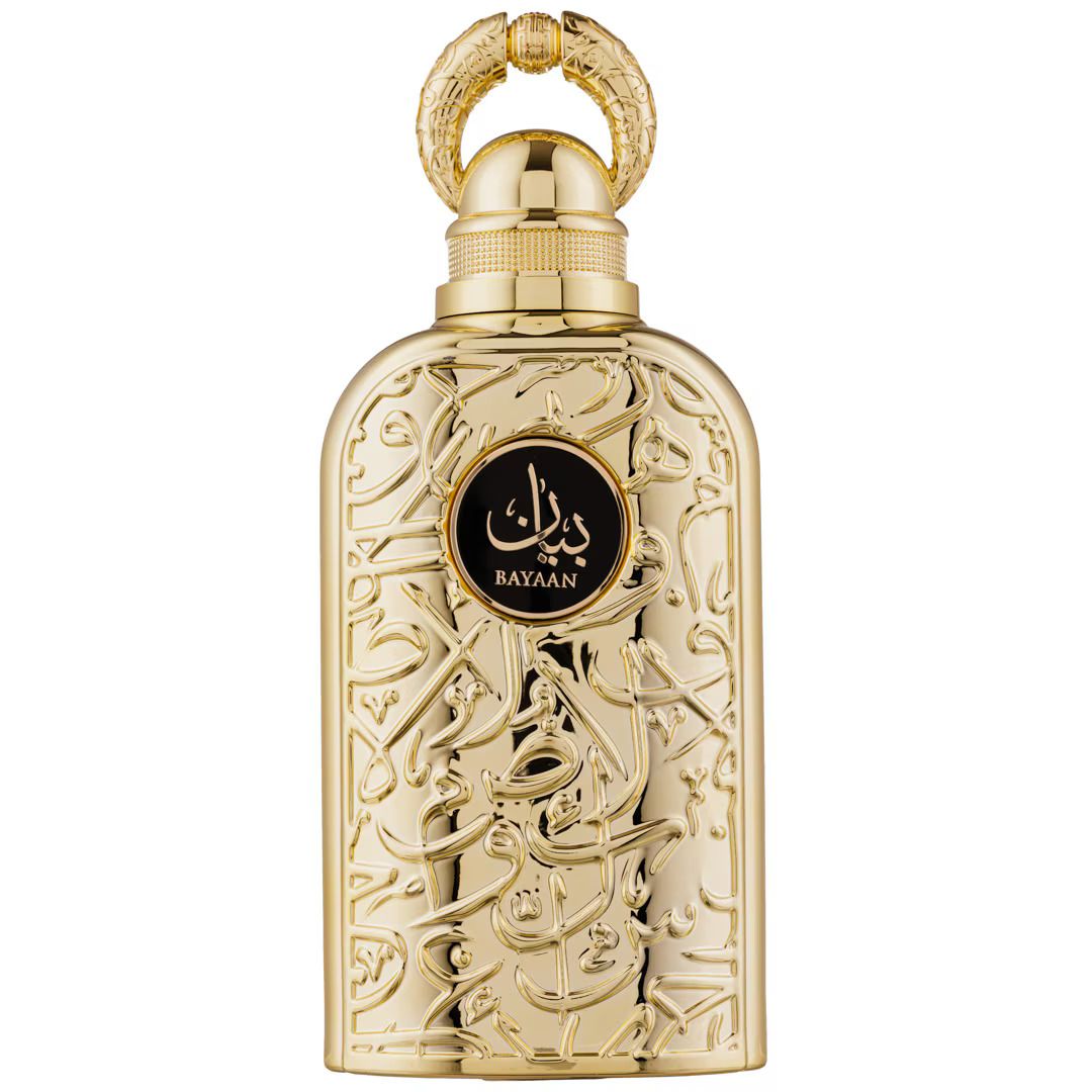 Goldfarbene Parfumflasche mit arabischen Schriftzeichen und rundem schwarzen Etikett mit Schriftzug. Aufsatz mit Griff.