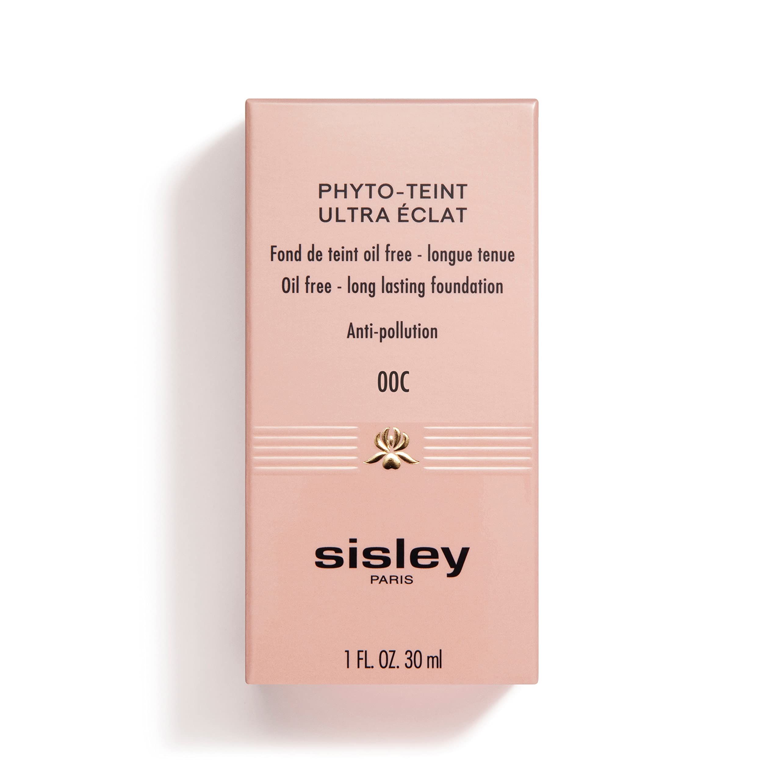 Rosa Verpackung mit Produktnamen und Marke Sisley. Text: Phyto-Teint Ultra Éclat, Oil free, Anti-pollution. Unten: 1 FL. OZ. 30 ml.