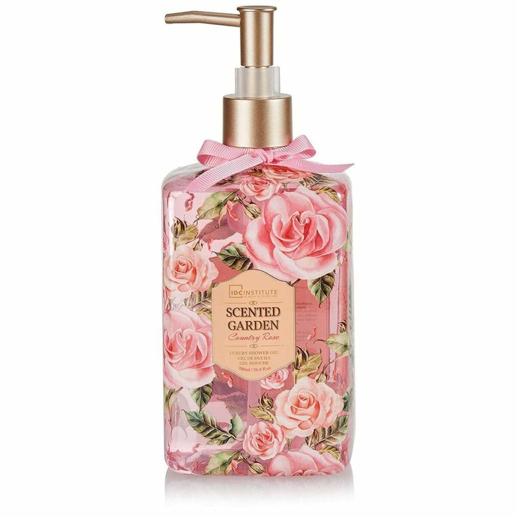 Transparente Flasche mit Rosenmuster, goldfarbenem Pumpkopf und rosa Schleife. Aufschrift: IDC INSTITUTE Scented Garden.