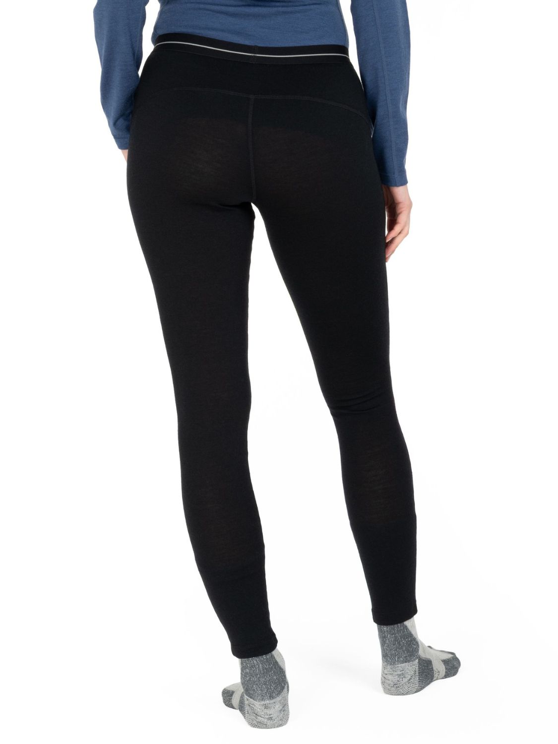 Rückansicht einer schwarzen Damen-Leggings aus Merinowolle.