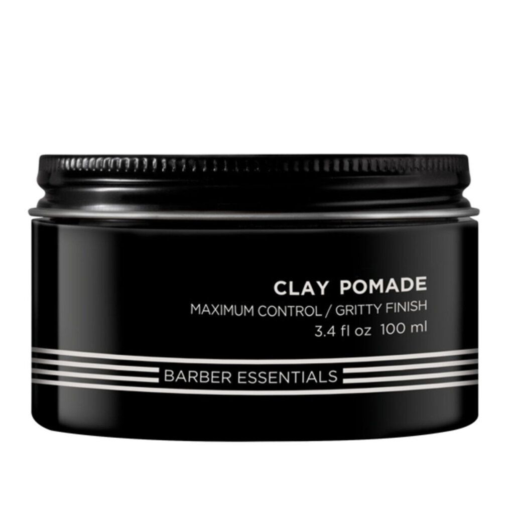 Schwarze Dose mit Deckel. Aufschrift: Clay Pomade, Barber Essentials. 3.4 fl oz 100 ml.