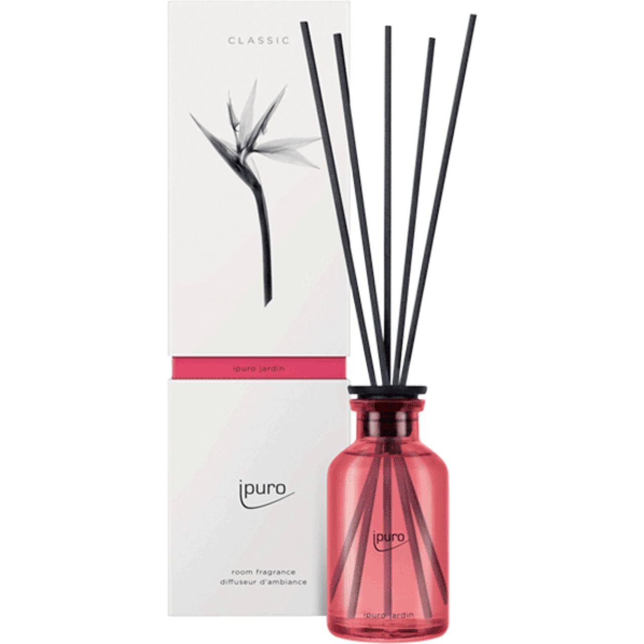 Raumduft-Diffusor mit schwarzen Stäbchen und rosa Flasche. Verpackung mit Logo und floralem Motiv.