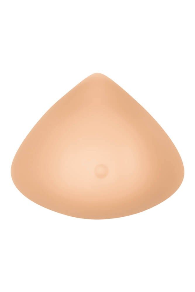 Brustprothese in Hautfarbe, tropfenförmig. Vollform. Mit kleiner Erhebung.