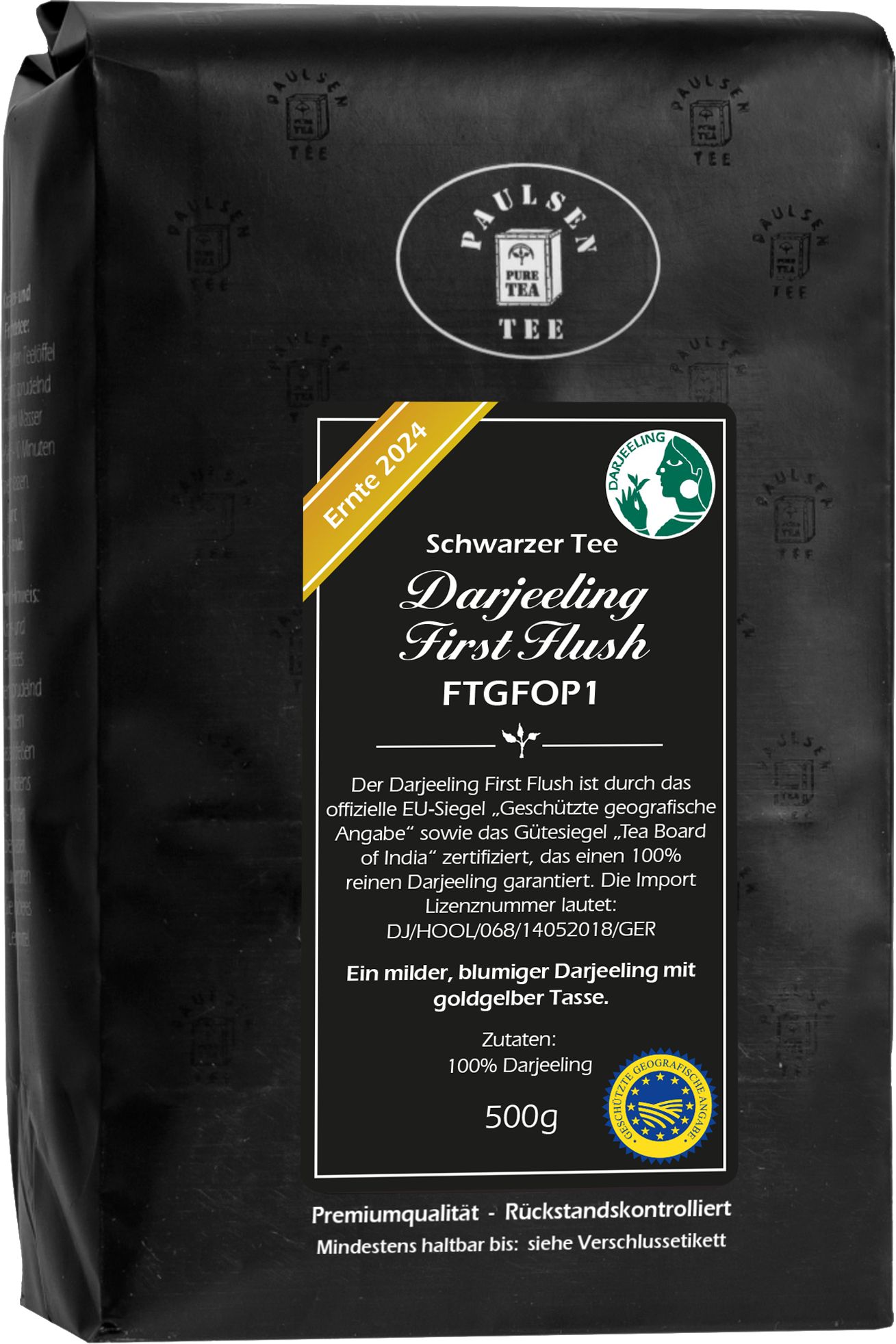 Schwarzer Tee-Packung. Aufschrift: Paulsen Tee, Darjeeling First Flush FTGFOP1, Ernte 2024. Schwarze Verpackung mit Produktinformationen und Siegeln.