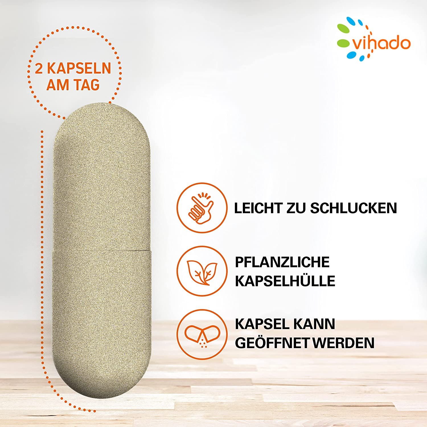 Una singola capsula beige di Vihado. Sul lato destro, icone con testi come "Facile da deglutire" e "Involucro della capsula vegetale". La capsula può essere aperta.