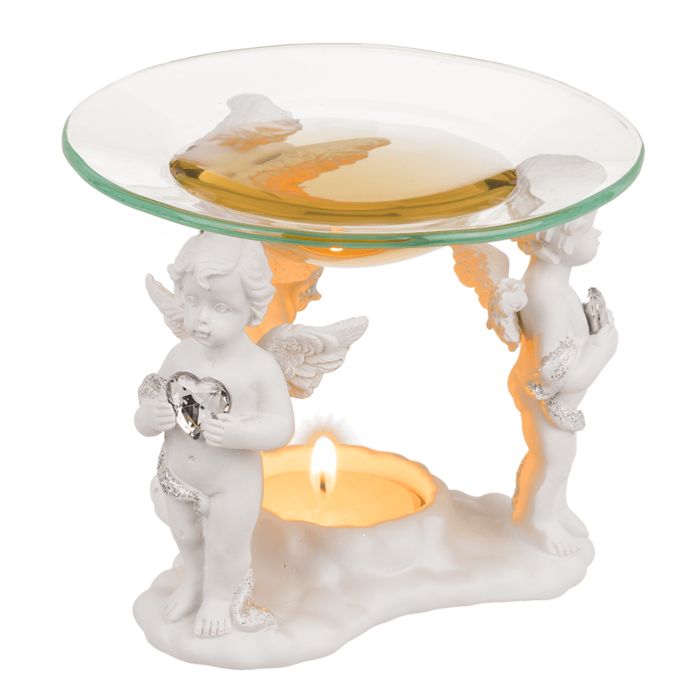 Lampe à parfum avec coupelle en verre, bougie allumée. Design ange, céramique blanche, coupelle ronde avec liquide.