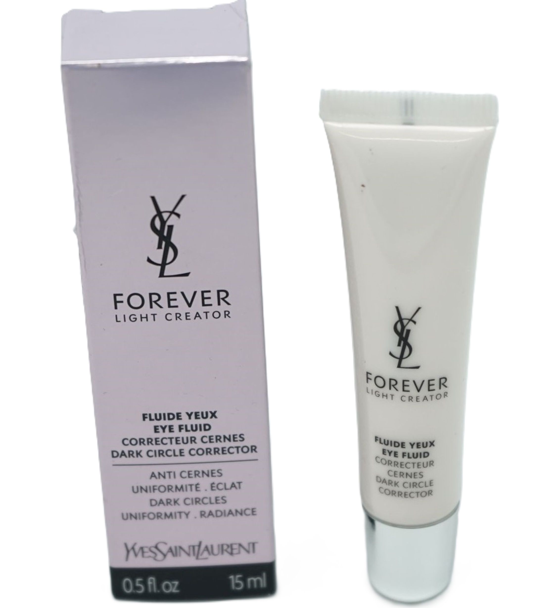 Weiße Tube und Schachtel. Auf der Tube und Schachtel steht "FOREVER LIGHT CREATOR". Produkt zur Korrektur von Augenringen.