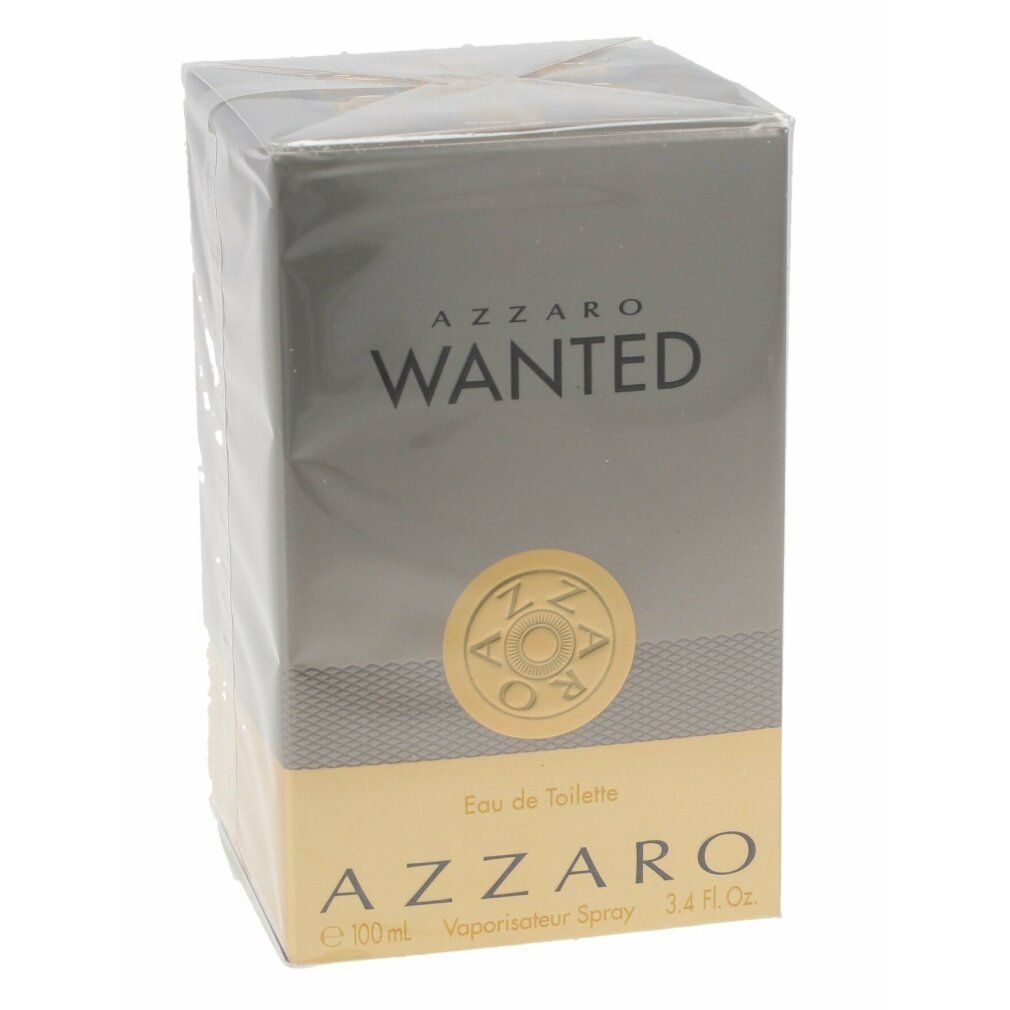 Azzaro Wanted Eau de Toilette in Verpackung. Graue Schachtel mit goldfarbenen Akzenten. Klarer Kunststoff umhüllt die Schachtel.
