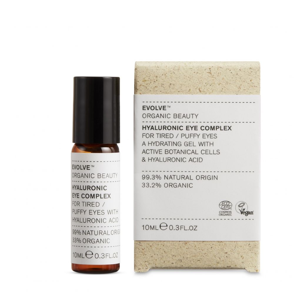 Braune Glasflasche und Karton. Aufschrift: Evolve, Hyaluronic Eye Complex, für müde/aufgedunsene Augen. Vegan-Siegel.