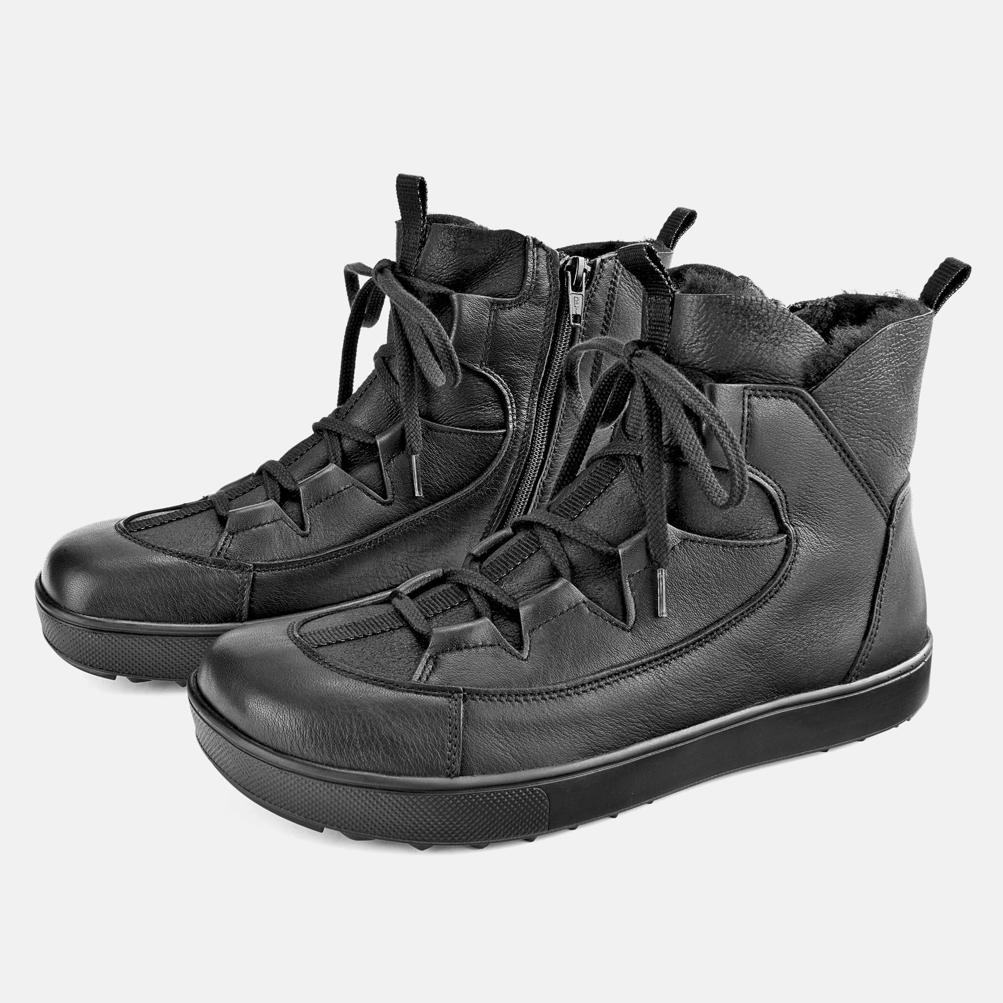 Schwarze Stiefeletten mit Schnürung und Reißverschluss. Breite Passform. Innenfutter. Profilsohle.