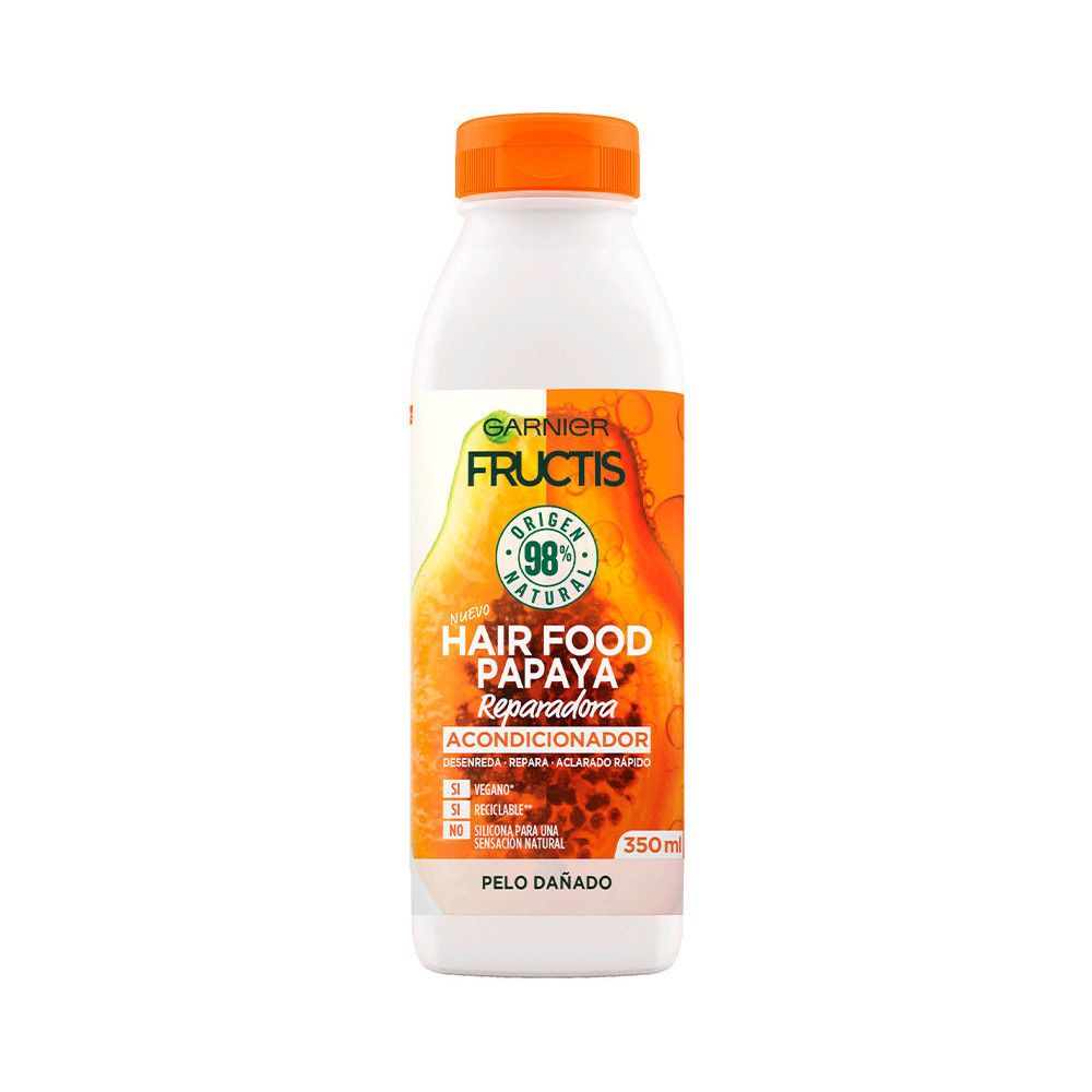 Weiße Flasche mit orangefarbenem Deckel. Aufschrift: Garnier Fructis Hair Food Papaya Reparatur Conditioner. 350ml.