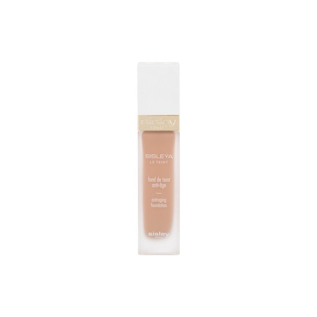 Sisley Sisleya Le Teint Foundation. Rechteckige Flasche mit weißem Deckel. Goldener Schriftzug Sisley Paris.