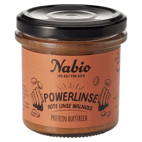 Glas mit Nabio Powerlinse Rote Linse Walnuss Protein Aufstrich. Braunes Etikett, schwarzer Deckel.