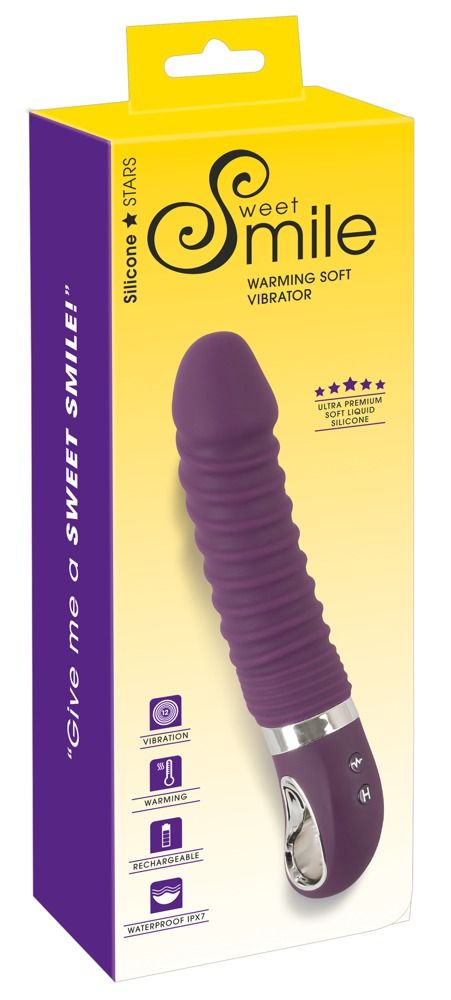 Lila Vibrator in Verpackung. Aufschrift: Sweet Smile, Warming Soft Vibrator. Verpackung mit Produktabbildung und Icons.