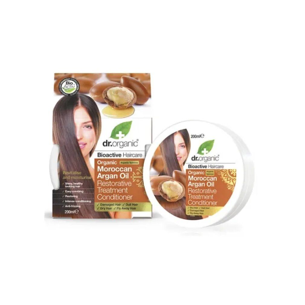 Dr. Organic Argan Maschera Cap, Dose und Verpackung. Aufdruck mit Produktname, Bio-Siegel, Arganöl-Abbildung und Frau.