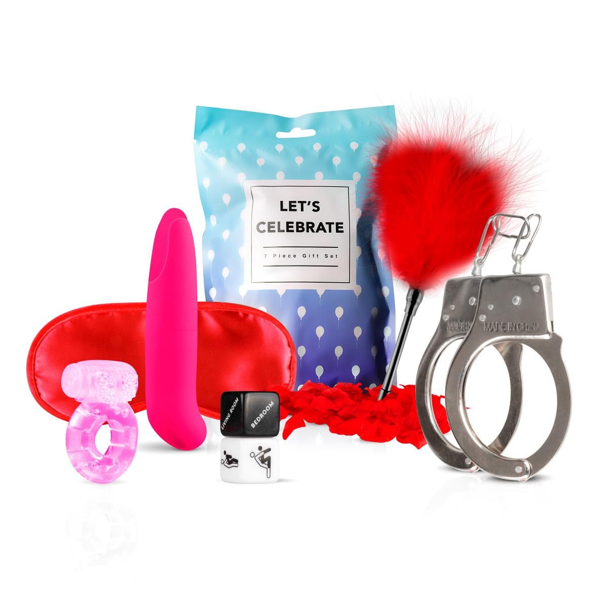 Geschenkset mit verschiedenen Produkten: Augenmaske, Vibrator, Ring, Federboa, Handschellen, Gleitmittel und Geschenkverpackung.