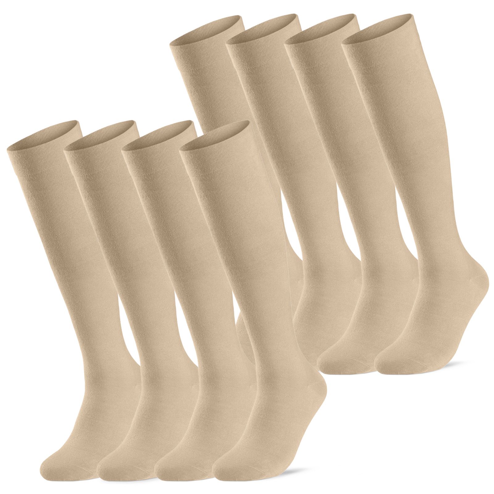 Mehrere beige Kompressionsstrümpfe. Kniestrümpfe, aus Stoff. Auf weißem Hintergrund.