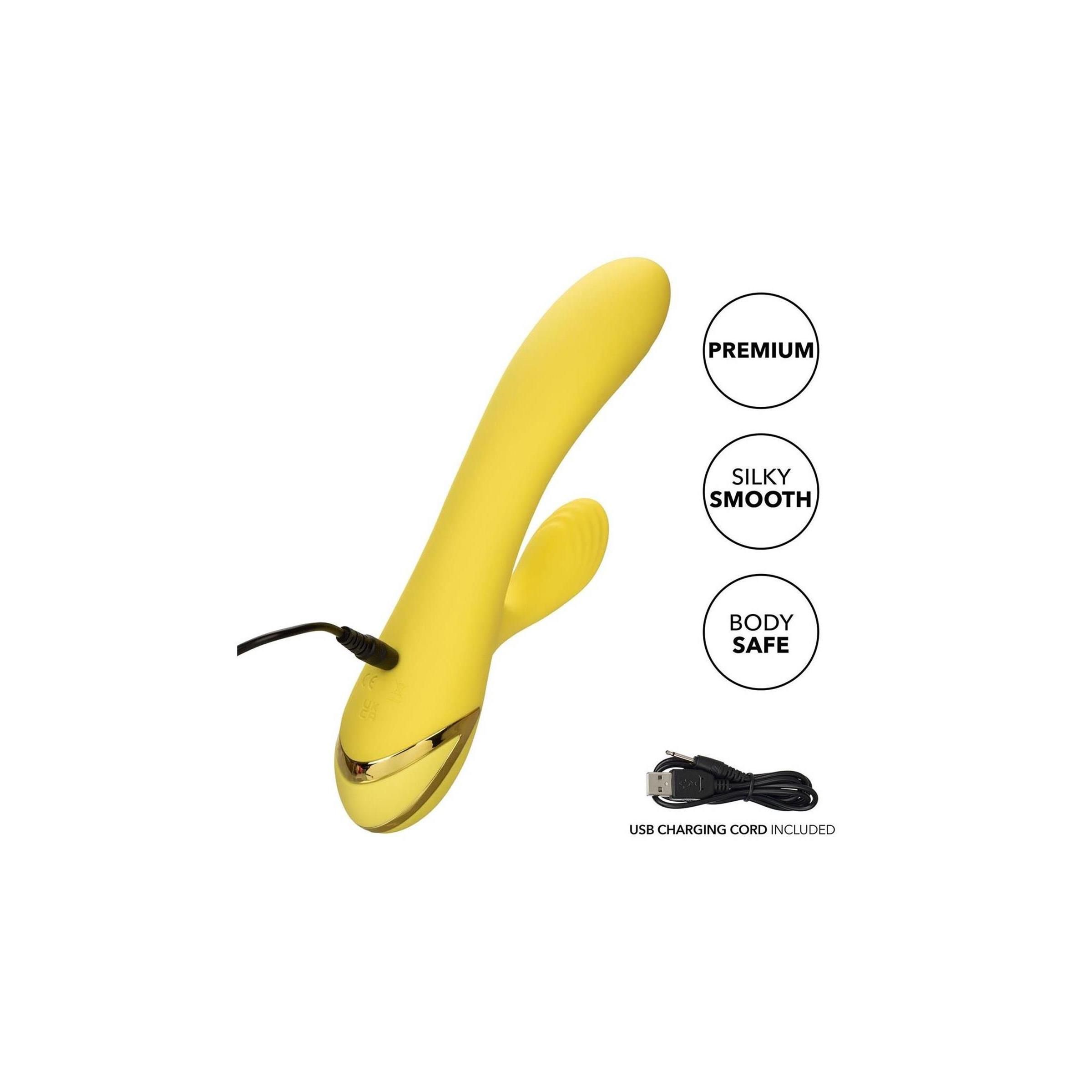 Gelbes Wellness-Produkt mit Ladekabel. Aufschrift: Premium, Silky Smooth, Body Safe. Auf weißem Hintergrund.