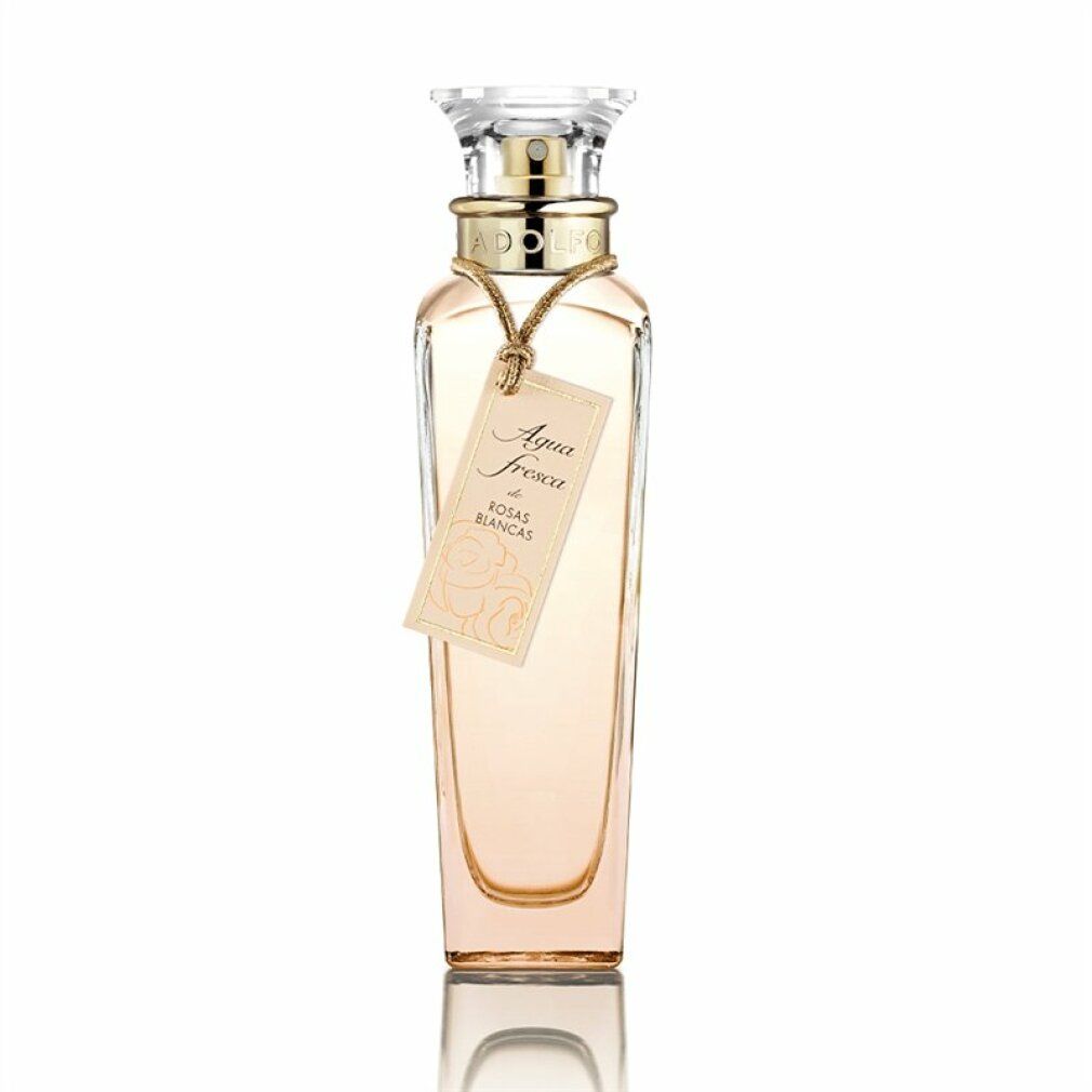 Parfümflasche mit Etikett. Aufschrift Agua fresca de Rosas Blancas. Transparente Flasche mit goldfarbenem Verschluss und Kordel.