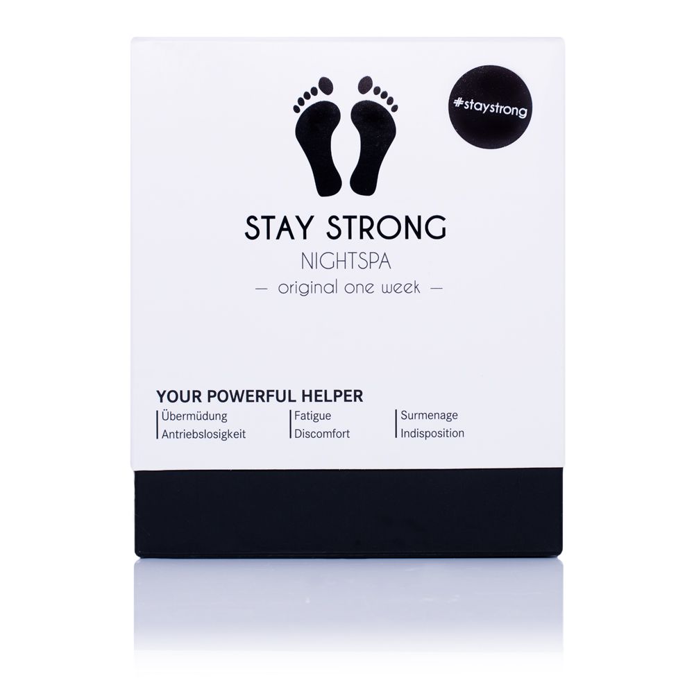 Weiße Verpackung mit schwarzem Boden. Aufdruck: STAY STRONG NIGHTSPA. Füße-Symbol. #staystrong. Text: YOUR POWERFUL HELPER.