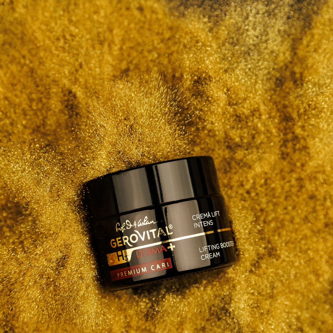 Schwarzer Tiegel. Aufschrift: Gerovital H3 Derma+, Premium Care, Creme Lift Intens, Lifting Booster Cream. Auf goldfarbenem Untergrund.