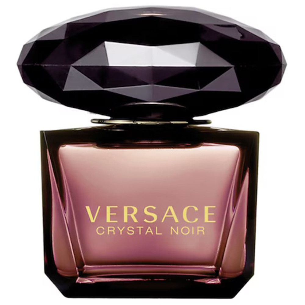 Versace Crystal Noir Eau de Toilette. Schwarzer, facettierter Deckel. Rosa Glasflasche mit Logo.
