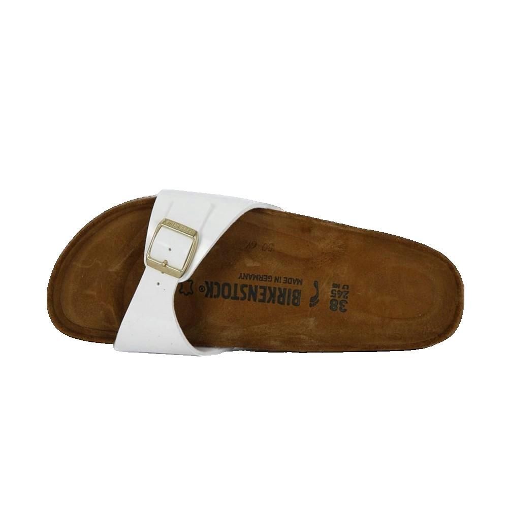 Sandalo dall'alto. Tomaia bianca, fibbia dorata. Plantare in sughero con logo Birkenstock. Taglia 38.