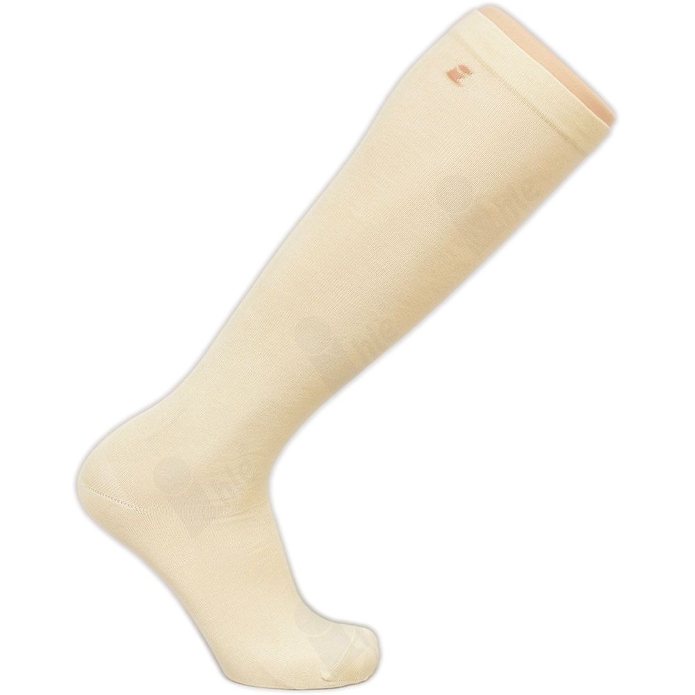 Beigefarbener Kniestrumpf. Angora-Material. Auf einem Fußmodell präsentiert. Logo am oberen Rand.