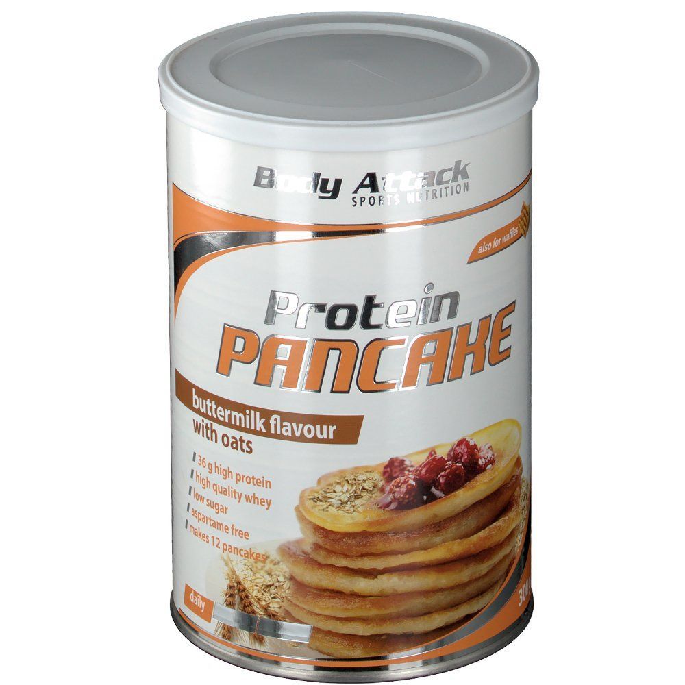Zylinderdose mit Protein Pancake. Aufschrift: Buttermilch-Geschmack mit Hafer. Abbildung von Pfannkuchen mit Beeren.