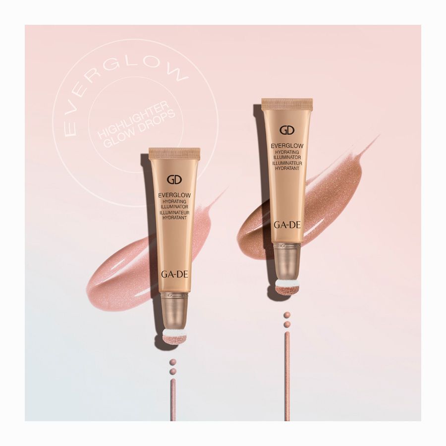 Zwei beige Tuben mit Applikator. Aufschrift: GD, Everglow Hydrating Illuminator, GA-DE. Produkt für die Haut.
