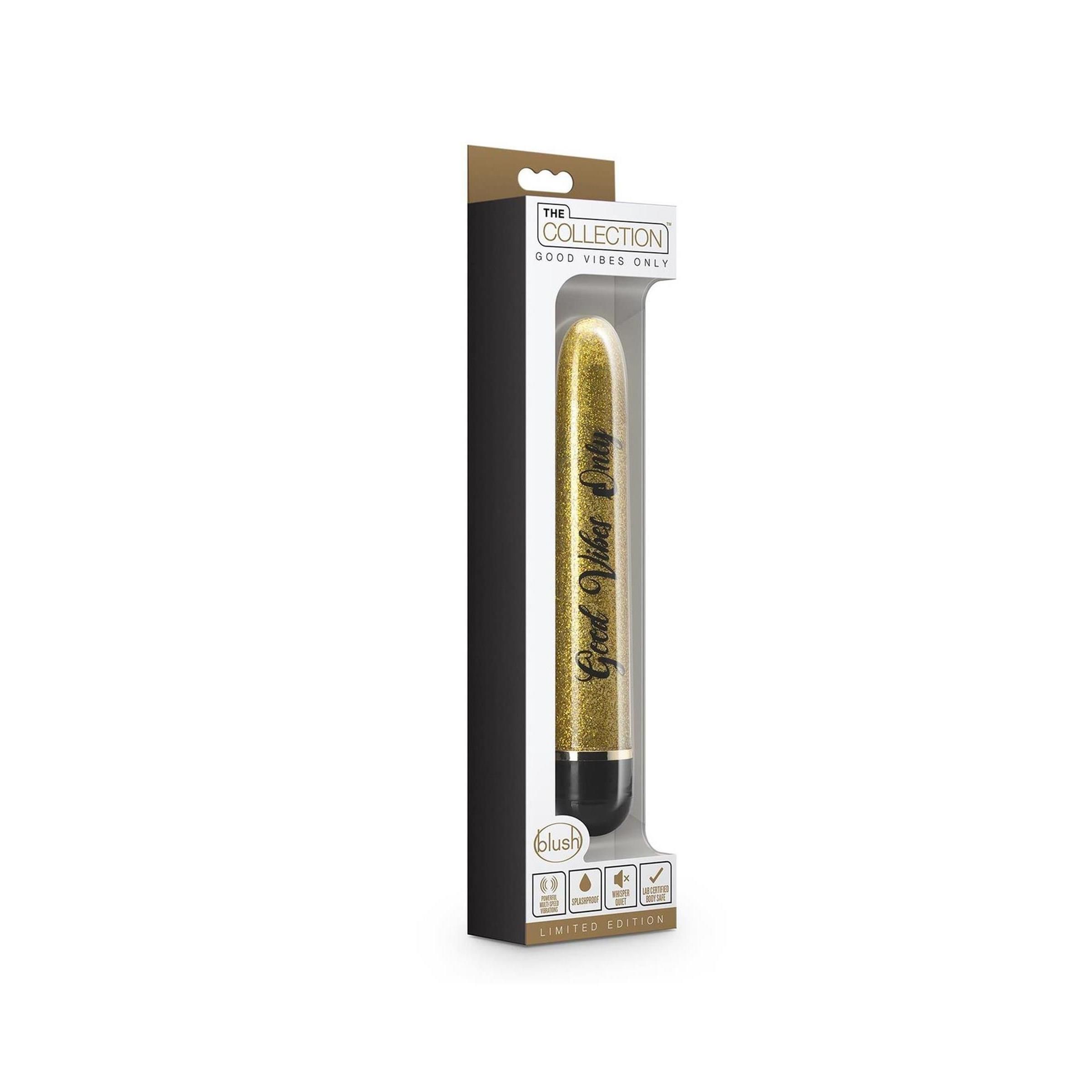 Verpackung mit goldfarbenem Vibrator. Schwarze Verpackung mit Produktnamen und Aufschrift 'Good Vibes Only'.