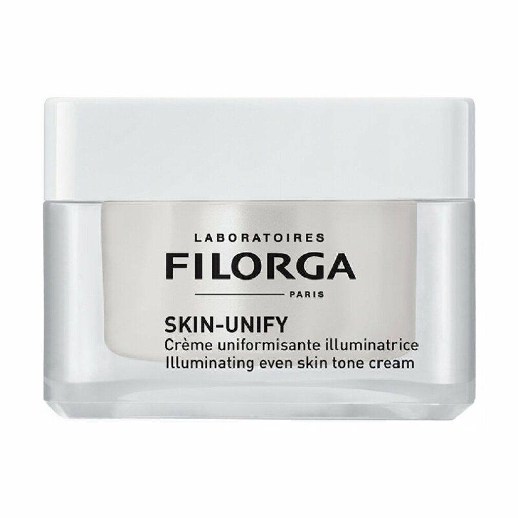 Creme-Tiegel mit weißem Deckel. Aufschrift: FILORGA SKIN-UNIFY. Klare Verpackung.