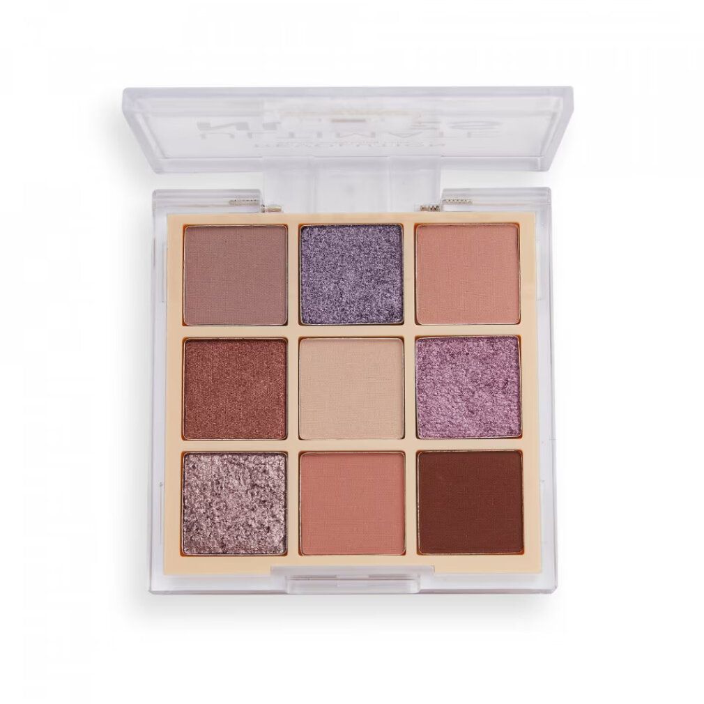 Geöffnete Lidschatten-Palette mit neun Farbtönen. Aufschrift: ULTIMATE NUDES. Transparente Verpackung.