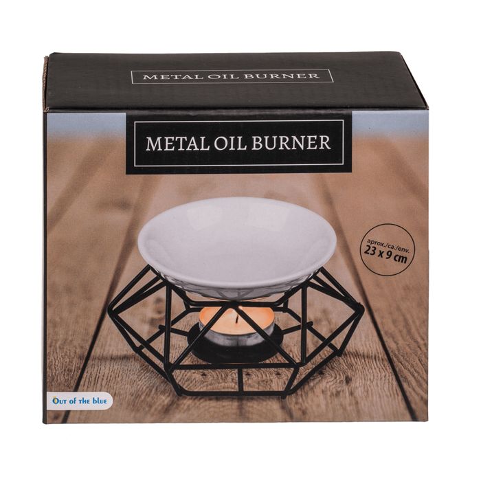 Productverpakking. Keramische olieverdamper op metalen frame. Opschrift: METAL OIL BURNER. Afmetingen: 23 x 9 cm.