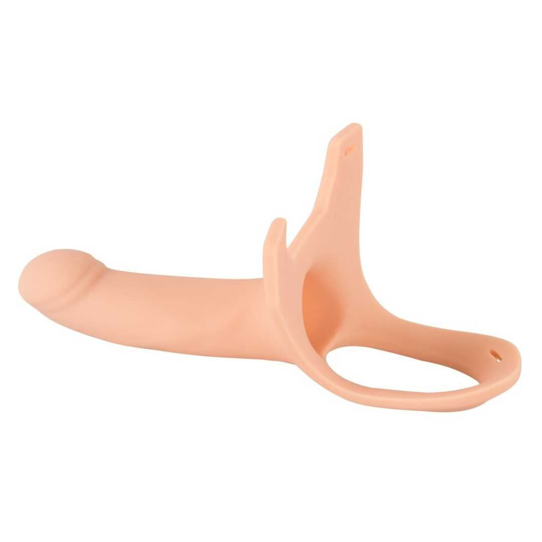 Strap-on beige con supporto. Base ad anello, supporto con due aperture. Forma allungata.