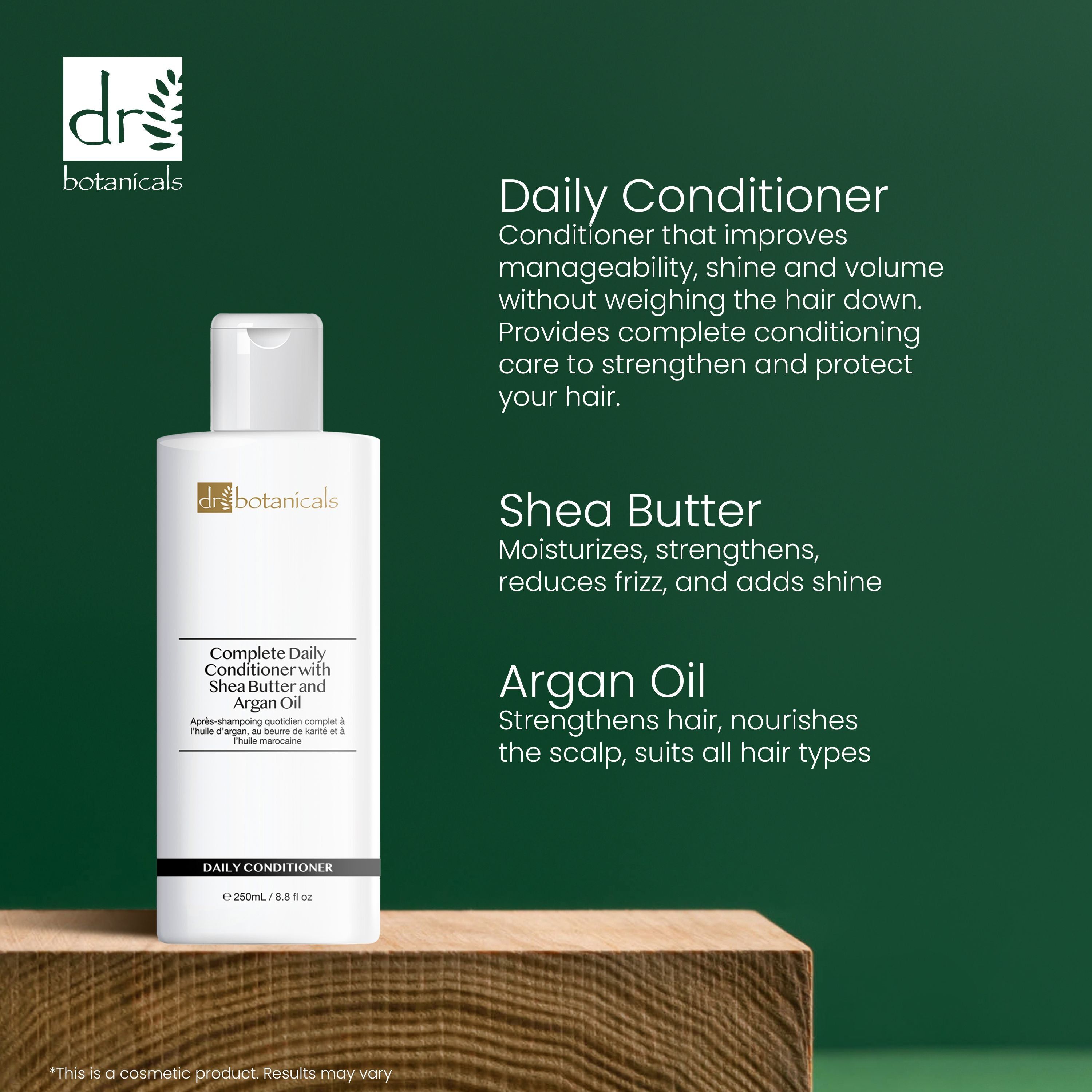 Flasche Conditioner auf Holzblock. Text: Complete Daily Conditioner with Shea Butter and Argan Oil. Marke: dr. botanicals. Text: Daily Conditioner.