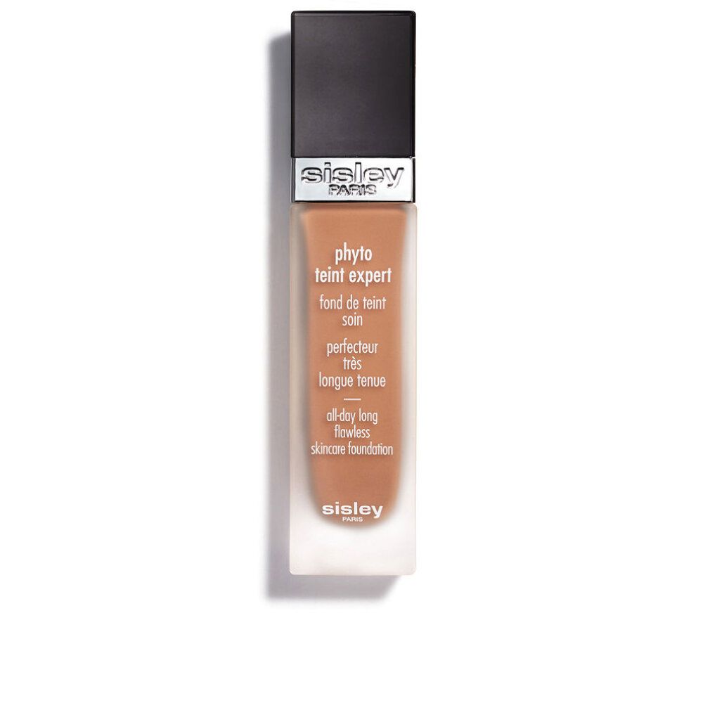 Sisley Phyto-Teint Expert Foundation-Flakon. Schwarzer Deckel, transparente Basis. Text: Phyto-Teint Expert, Fond de teint soin, perfecteur, longue tenue.