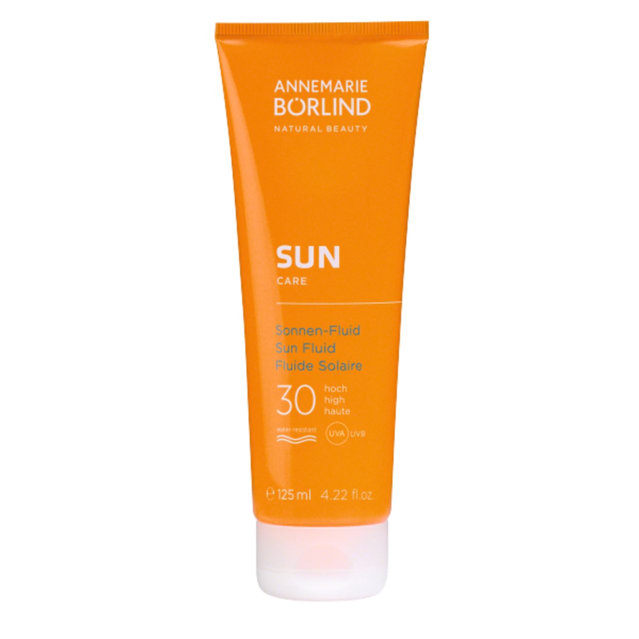 Orange Tube mit weißem Deckel. Text: ANNEMARIE BÖRLIND, SUN CARE, Sonnen-Fluid LSF 30. 125 ml.