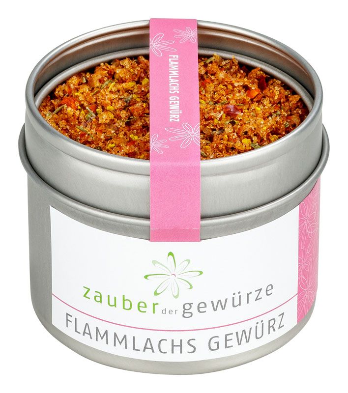 Runde Dose mit Gewürzmischung. Rosa Etikett mit Schriftzug 'Flammlachs Gewürz'. Weißes Etikett mit 'Zauber der Gewürze'.