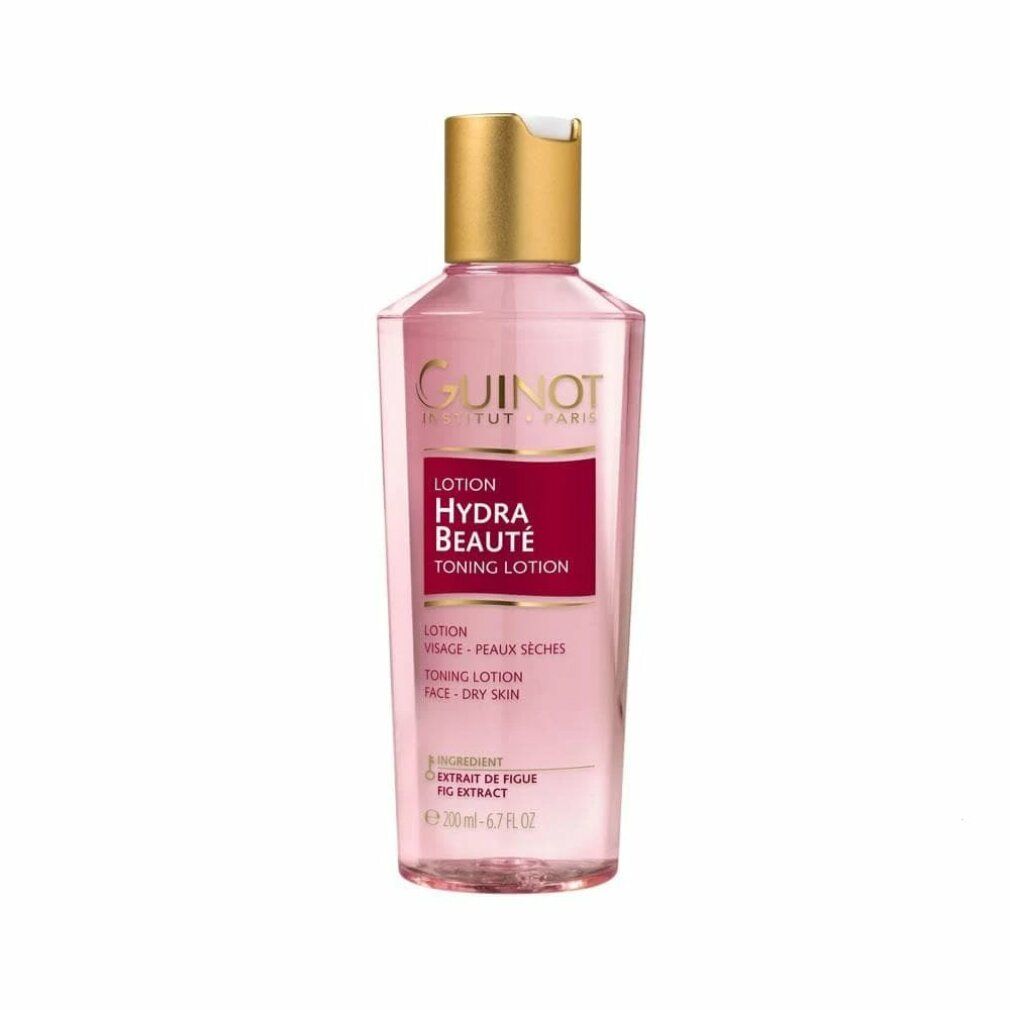 Guinot Hydra Beaute Lotion. Transparente Flasche mit rosa Flüssigkeit, goldfarbenem Deckel. Rotes Etikett mit Produktnamen.