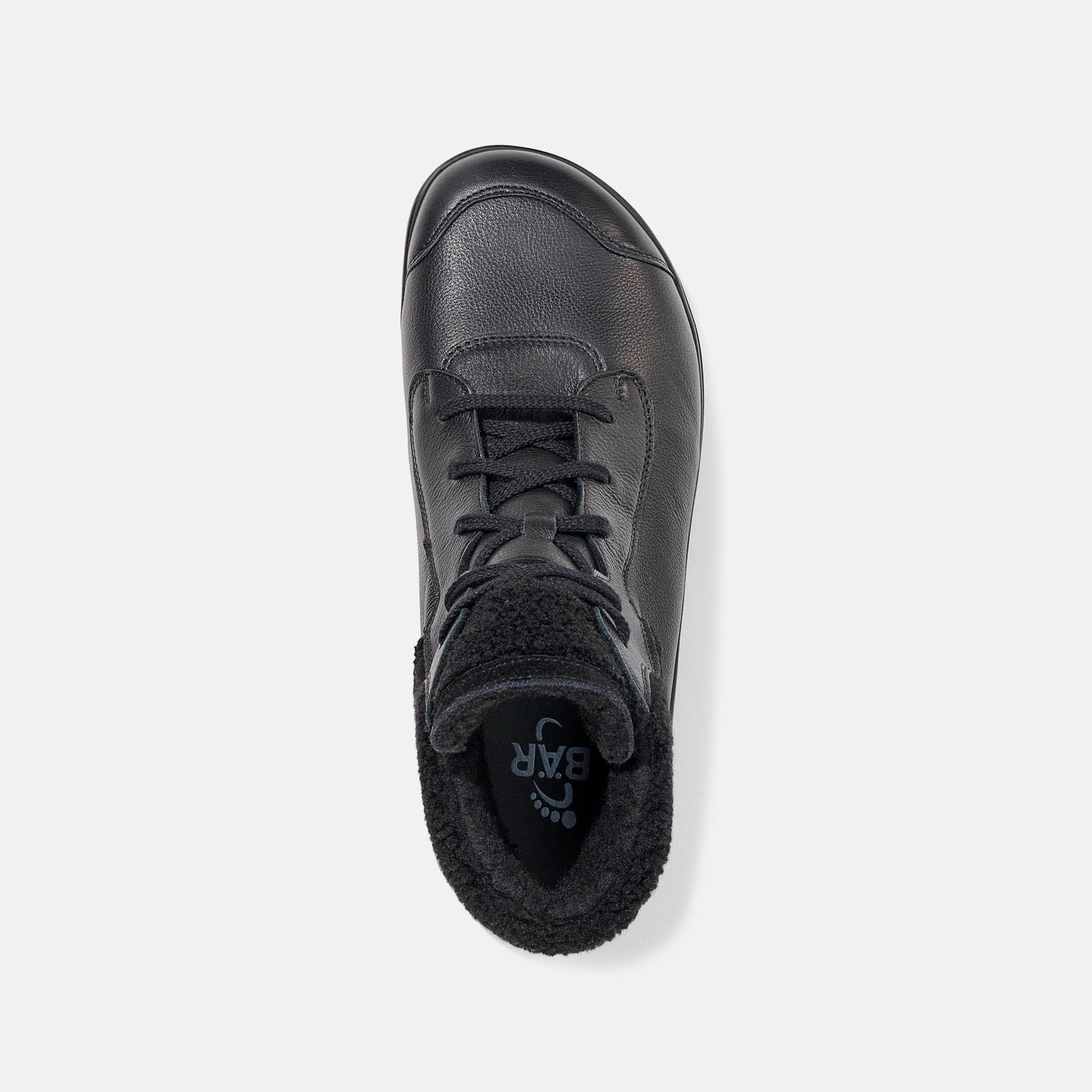 Oberansicht schwarzer Damen-Stiefeletten aus Leder, breite Passform, Lammfellfutter.