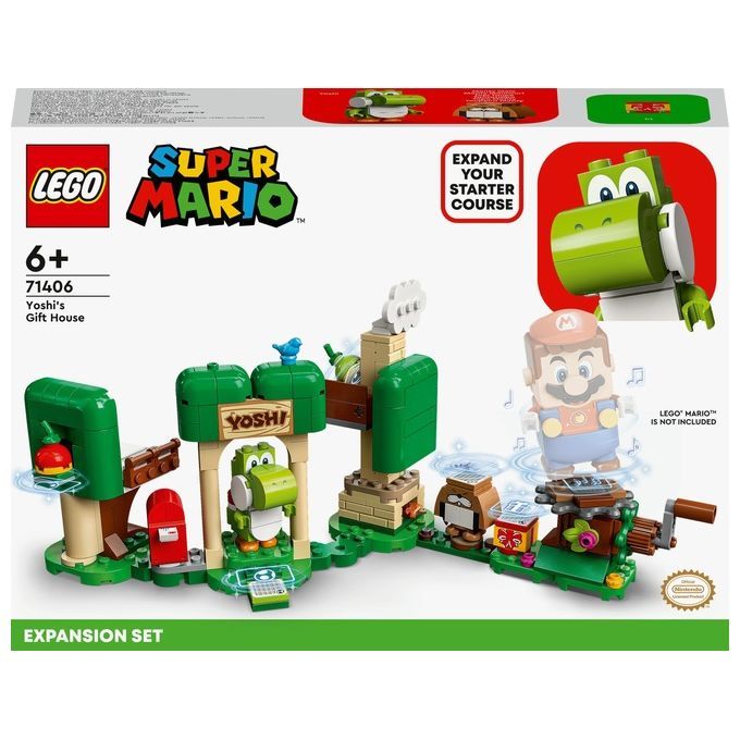 Set di espansione LEGO Super Mario, la casa dei regali di Yoshi. La confezione mostra un set di gioco assemblato con Yoshi, una figura di Mario e vari elementi di costruzione verdi e marroni. Include una figura di Yoshi, una casa, alberi e altri elementi. Adatto a bambini dai 6 anni in su.