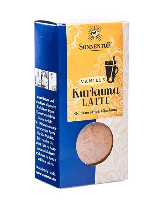 Sonnentor Kurkuma Latte Vanille Bio: Kartonverpackung mit Sichtfenster und Text über altes Wissen.