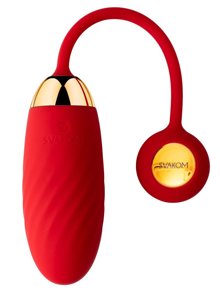 Roter, länglicher Gegenstand mit goldfarbenem Abschluss und rundem Element. Spiralförmige Textur. Weißer Hintergrund.