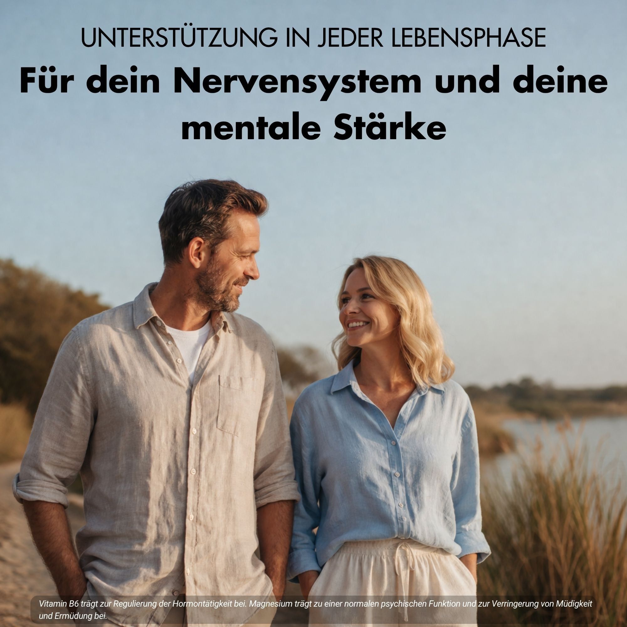 Ein Paar spaziert lächelnd am Wasser, symbolisiert mentale Stärke und Nervensystem-Unterstützung.