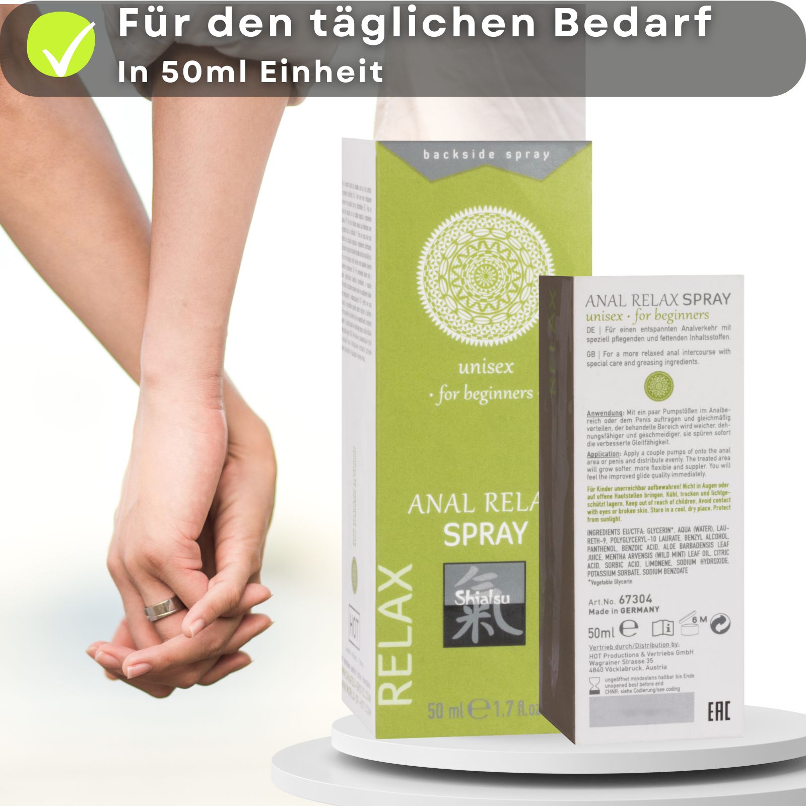 Produkt und Verpackung. Text: ANAL RELAX SPRAY, 50ml. Paar im Hintergrund.