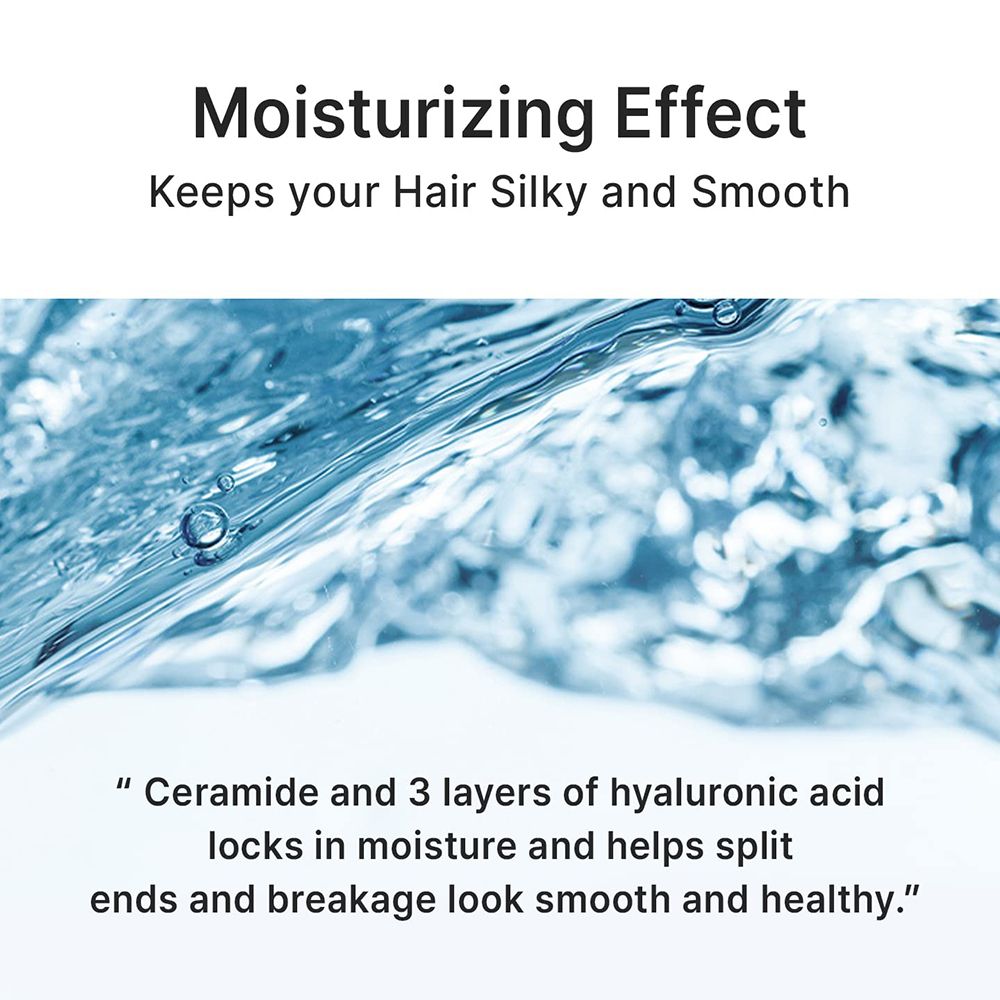 Nahaufnahme von Wasser mit Blasen. Text: Feuchtigkeitsspendende Wirkung. Hält Ihr Haar seidig und glatt.