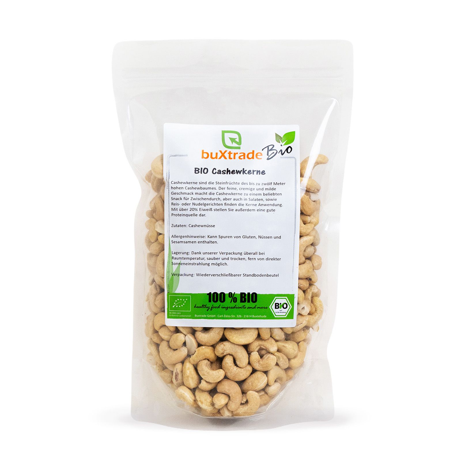 Transparente Verpackung mit buXtrade Bio Cashewkernen. Etikett mit Produktinformationen und Bio-Siegel.